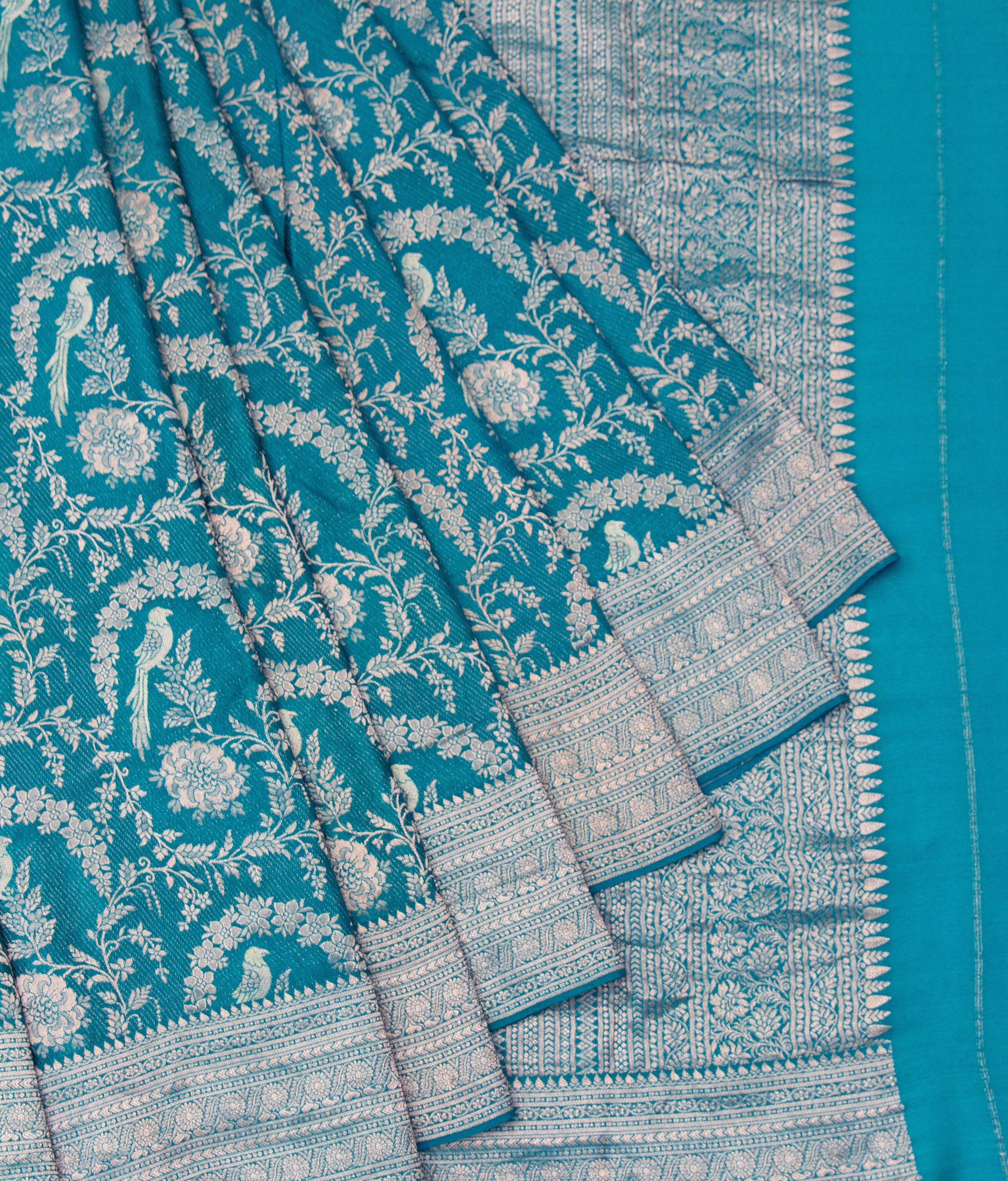 Jangla: Turquoise Blue Brocade Mysore Crepe Silk Saree