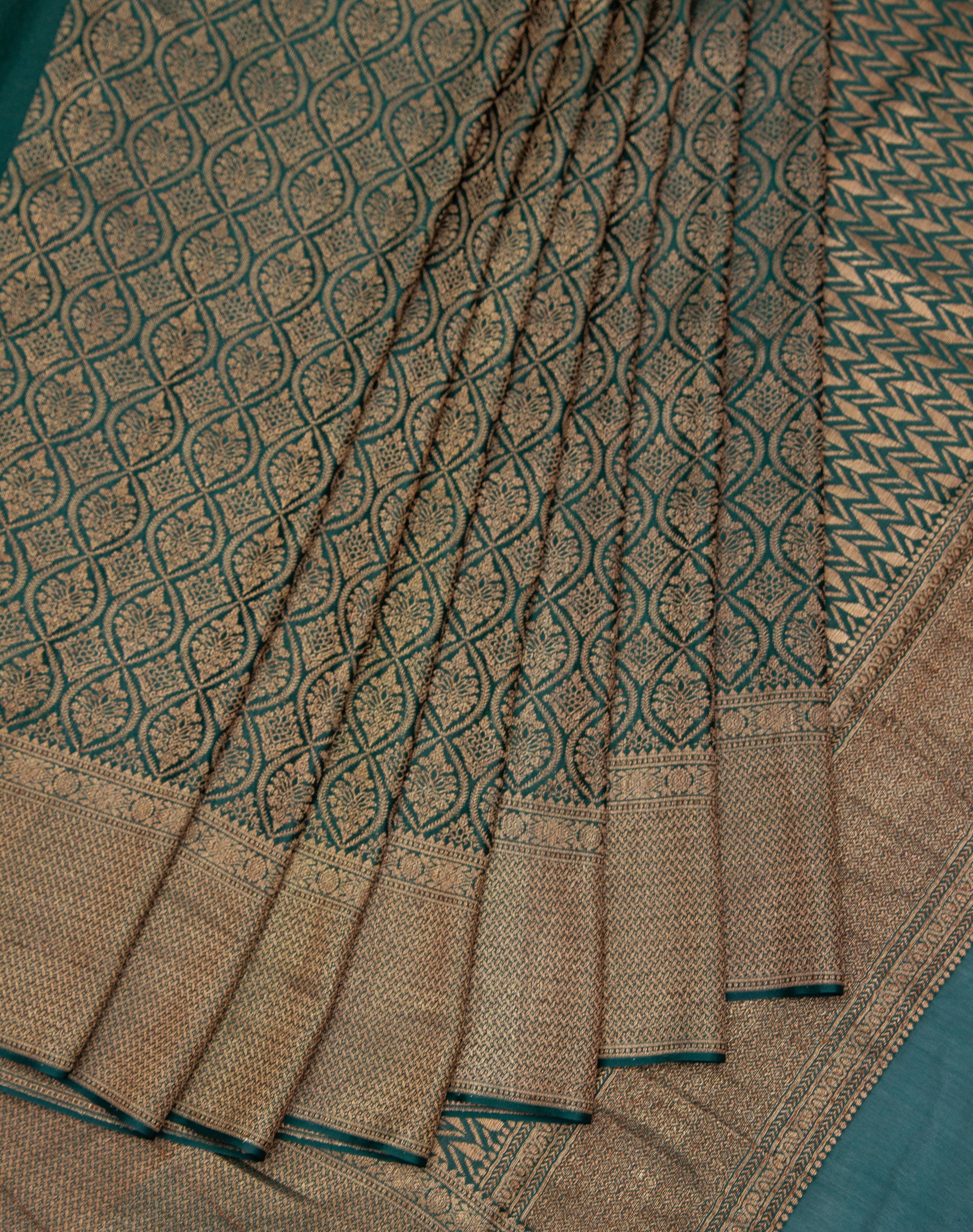 Saanjh: Bottle Green Brocade Mysore Crepe Silk Saree
