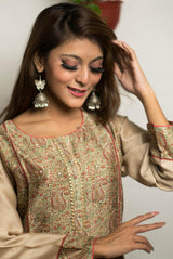 A women wearing beige chanderi kurti, ethnic wear for women