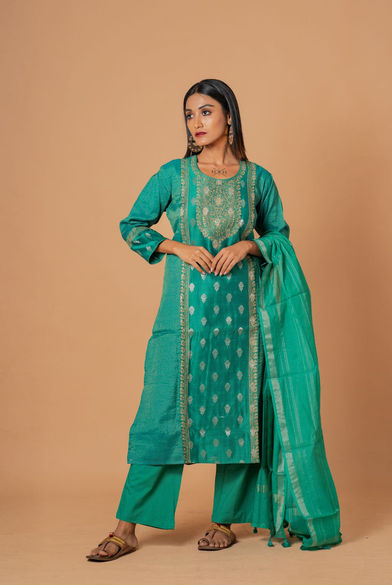 A women wearing sea green woven chanderi salwar suit, ethnic wear for women