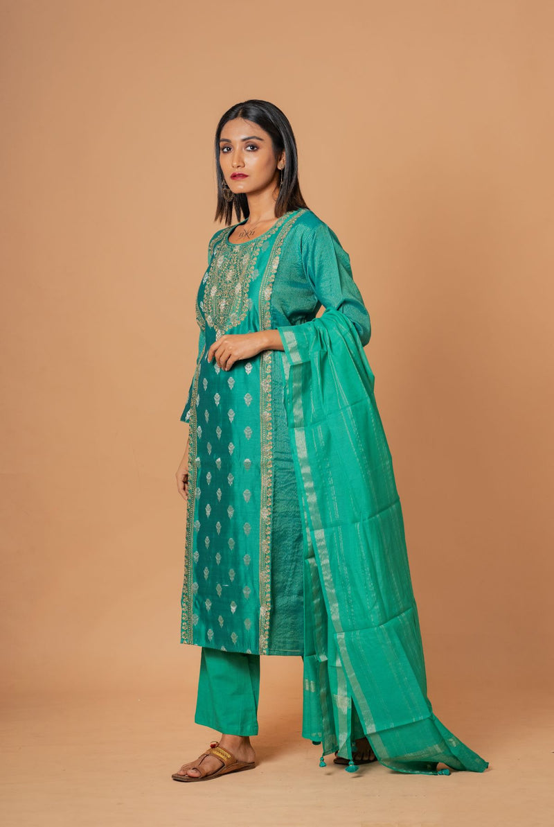 A women wearing sea green woven chanderi salwar suit, ethnic wear for women