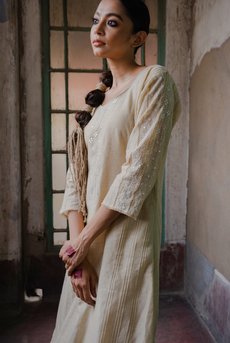 A women wearing beige chanderi salwar suit, ethnic wear for women