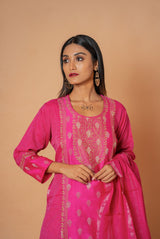 A women wearing rani woven chanderi suit set with dupatta, party wear for women