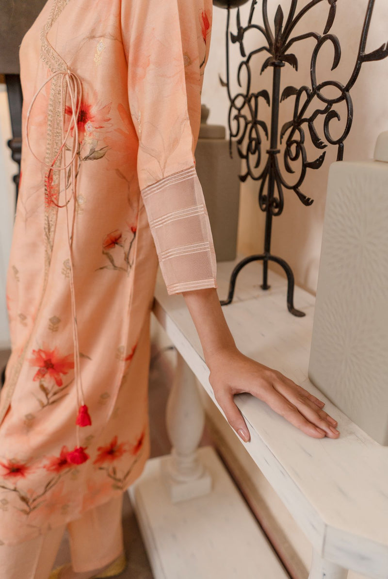 A women wearing peach pure chanderi angrakha, ethnic wear for women