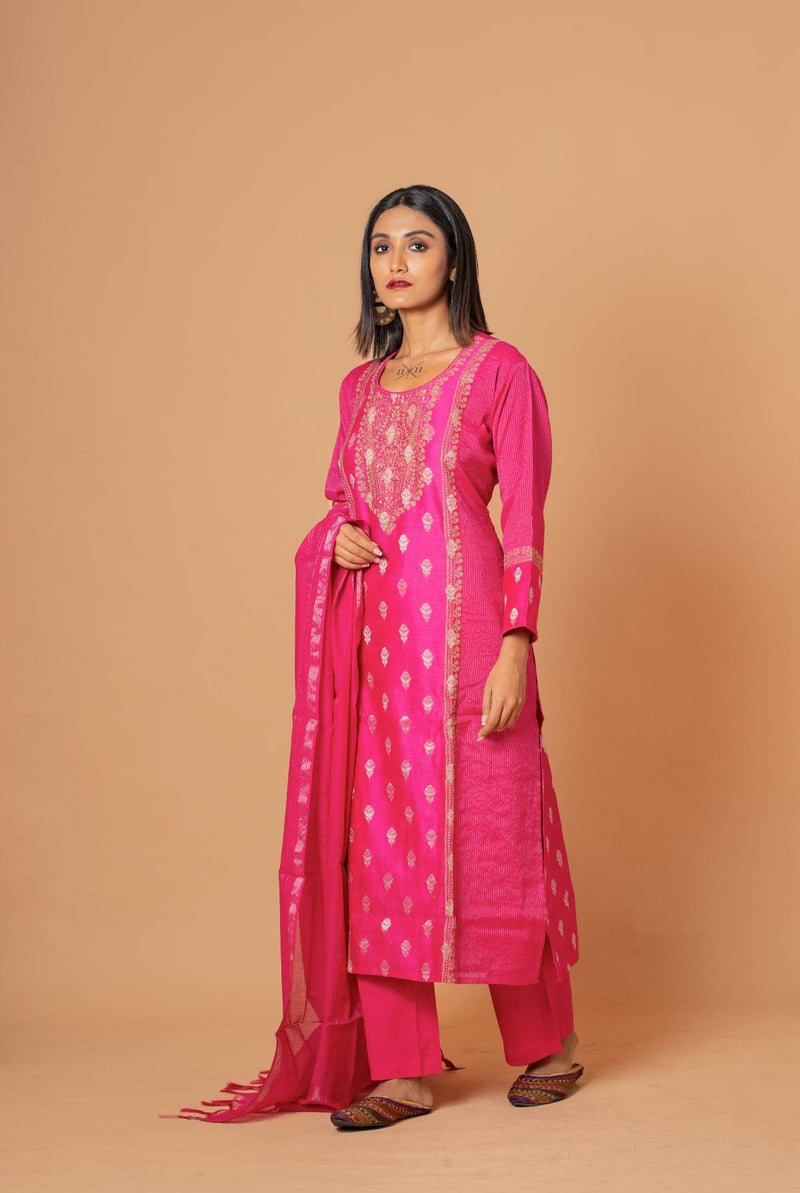 A women wearing rani woven chanderi suit set with dupatta, party wear for women