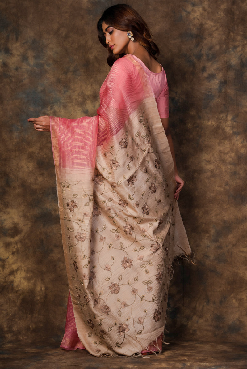 A woman wearing pink pure organza saree with woven zari stripes, latest saree, new saree collection