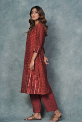 A women wearing brick red shibori printed pure chanderi kurti, ethnic wear for women