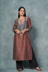 A women wearing chocolate brown pure chanderi printed kurti, ethnic wear for women