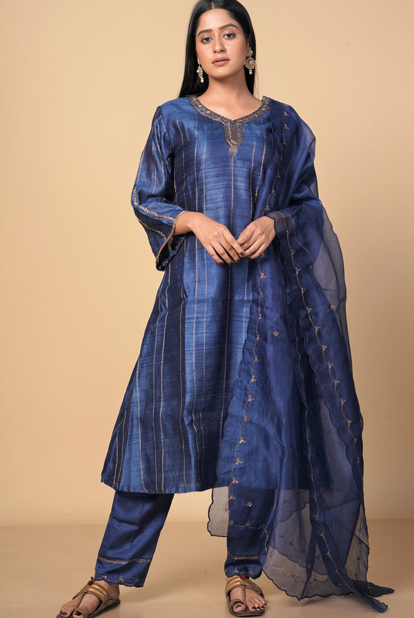 A women wearing navy blue pure tussar party wear salwar suit, ethnic wear for women