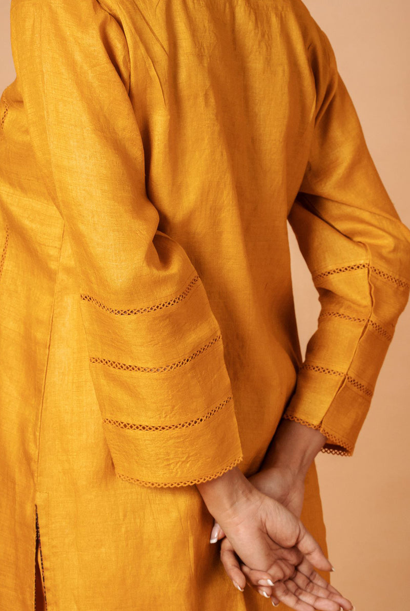 A women wearing mustard pure tussar kurti set, ethnic wear for women