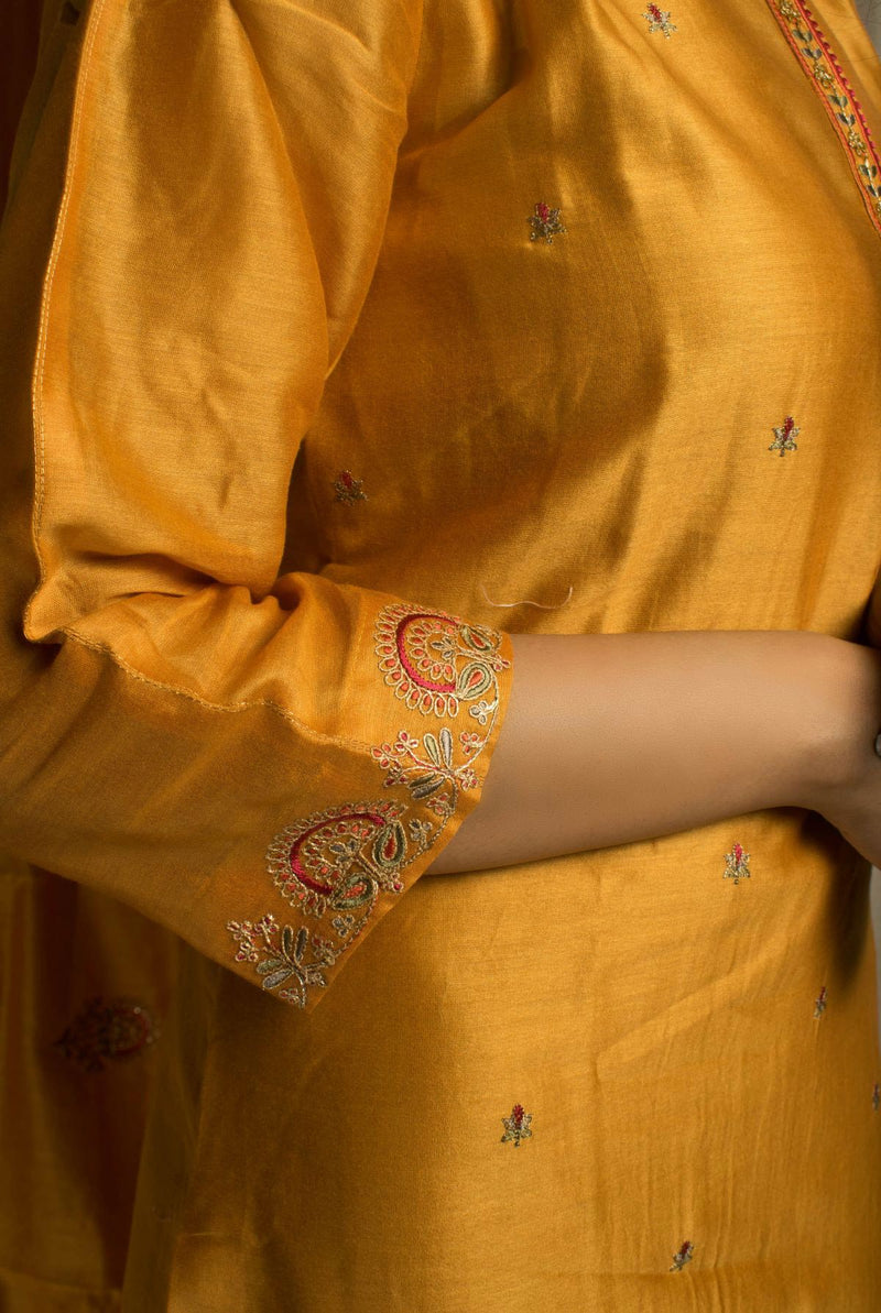 A women wearing mustard chanderi salwar suit, Indian wear for women