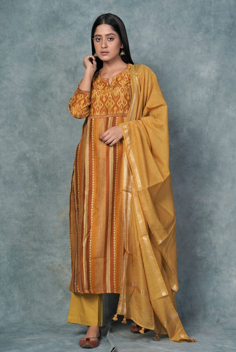 A women wearing mustard pure chanderi salwar suit, ethnic wear for women