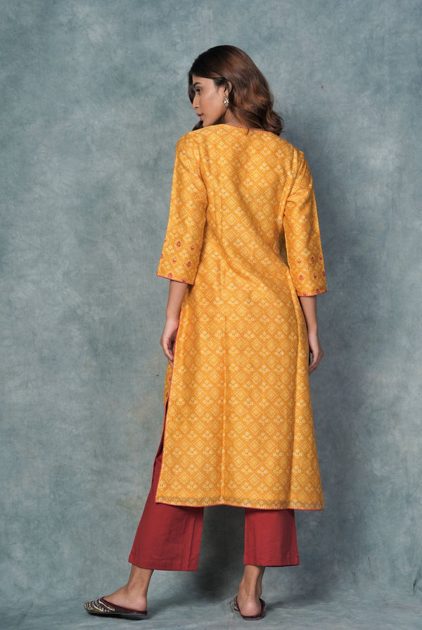 A women wearing mustard pure chanderi printed kurti, ethnic wear for women
