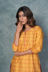 A women wearing mustard pure chanderi printed kurti, ethnic wear for women