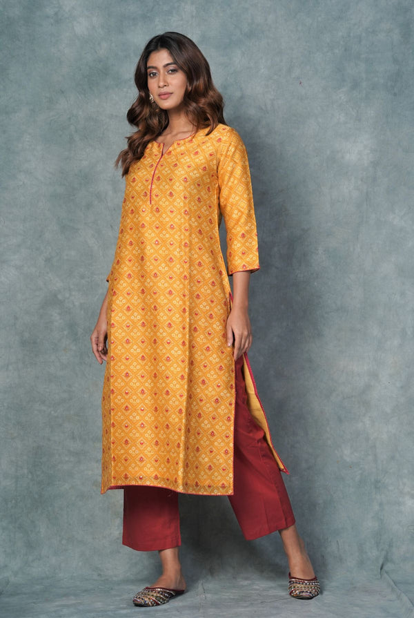 A women wearing mustard pure chanderi printed kurti, ethnic wear for women