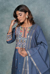A women wearing prussian blue pure chanderi ethnic salwar suit, party wear for women