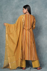A women wearing mustard pure chanderi salwar suit, ethnic wear for women