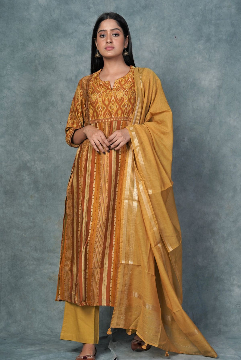 A women wearing mustard pure chanderi salwar suit, ethnic wear for women