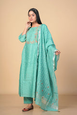 A women wearing green pure chanderi salwar suit, ethnic wear for women