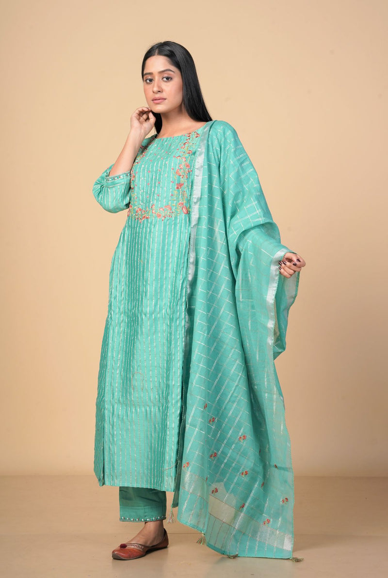 A women wearing green pure chanderi salwar suit, ethnic wear for women