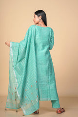 A women wearing green pure chanderi salwar suit, ethnic wear for women