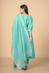 A women wearing green pure chanderi salwar suit, ethnic wear for women