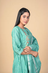 A women wearing green pure chanderi salwar suit, ethnic wear for women