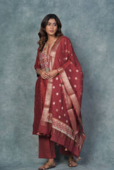 A women wearing dark red pure chanderi printed salwar suit, ethnic wear for women