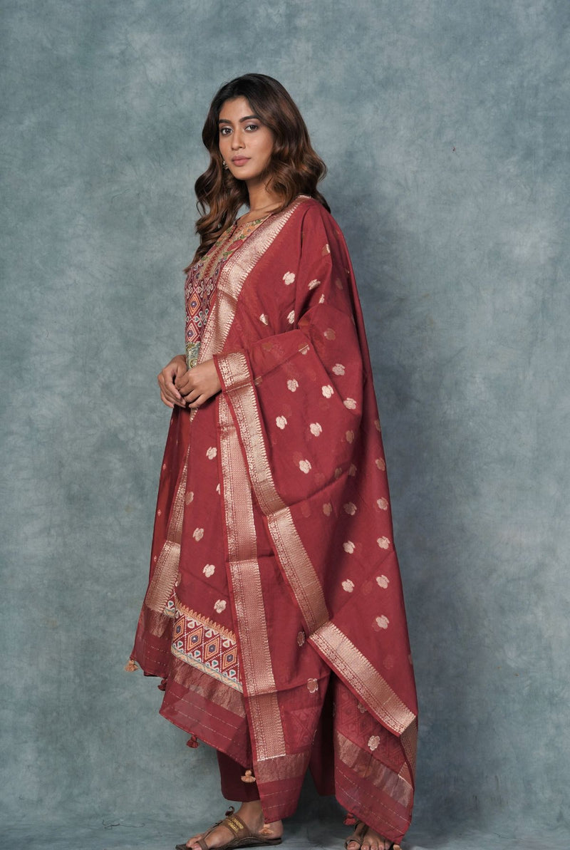 A women wearing dark red pure chanderi printed salwar suit, ethnic wear for women