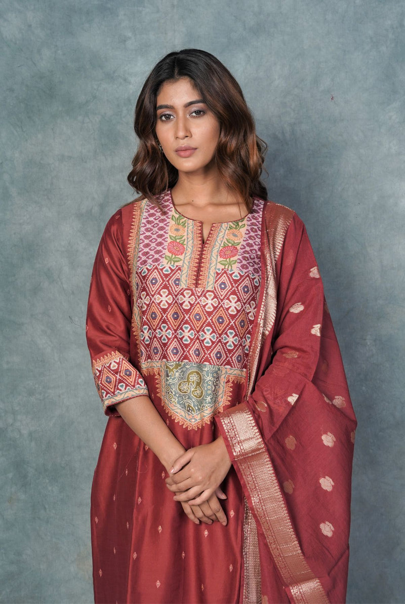 A women wearing dark red pure chanderi printed salwar suit, ethnic wear for women