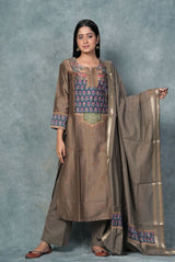 A women wearing brown pure chanderi ethnic salwar suit, party wear for women