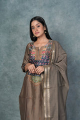 A women wearing brown pure chanderi ethnic salwar suit, party wear for women