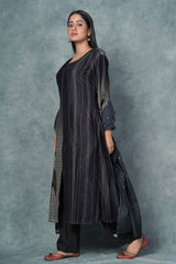A women wearing midnight blue pure chanderi printed salwar suit, ethnic wear for women