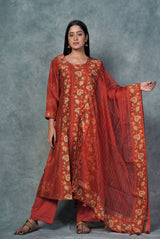 A women wearing brick red pure chanderi printed salwar suit, ethnic wear for women