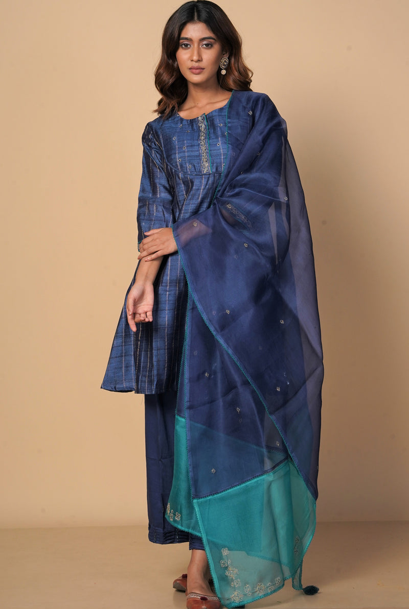 A women wearing navy blue pure tussar party wear salwar suit, ethnic wear for women