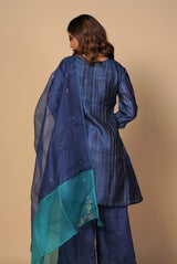 A women wearing navy blue pure tussar party wear salwar suit, ethnic wear for women