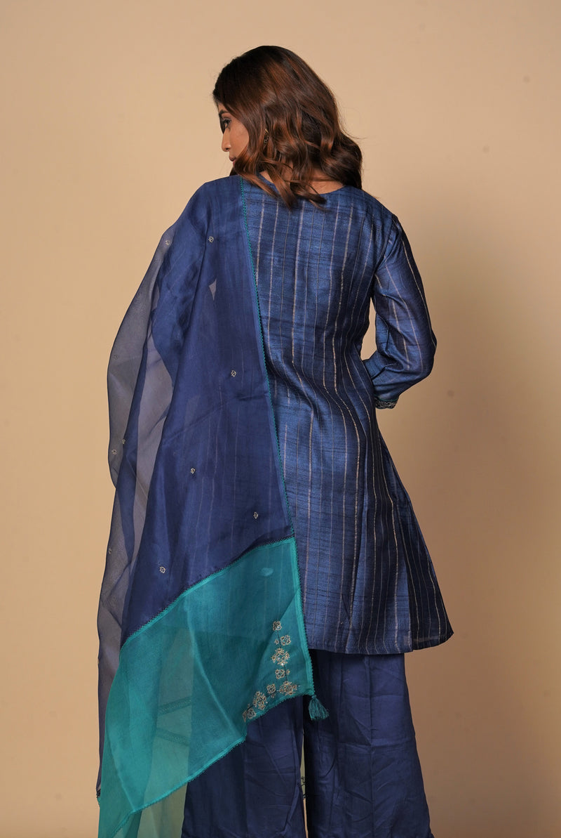 A women wearing navy blue pure tussar party wear salwar suit, ethnic wear for women