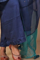 A women wearing navy blue pure tussar party wear salwar suit, ethnic wear for women
