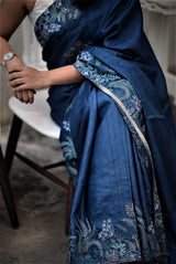 A woman wearing blue pure tussar saree, latest saree, new saree collection