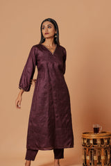 A women wearing coffee pure tussar ethnic attire, party wear suit for women