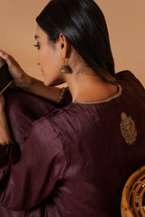A women wearing coffee pure tussar ethnic attire, party wear suit for women