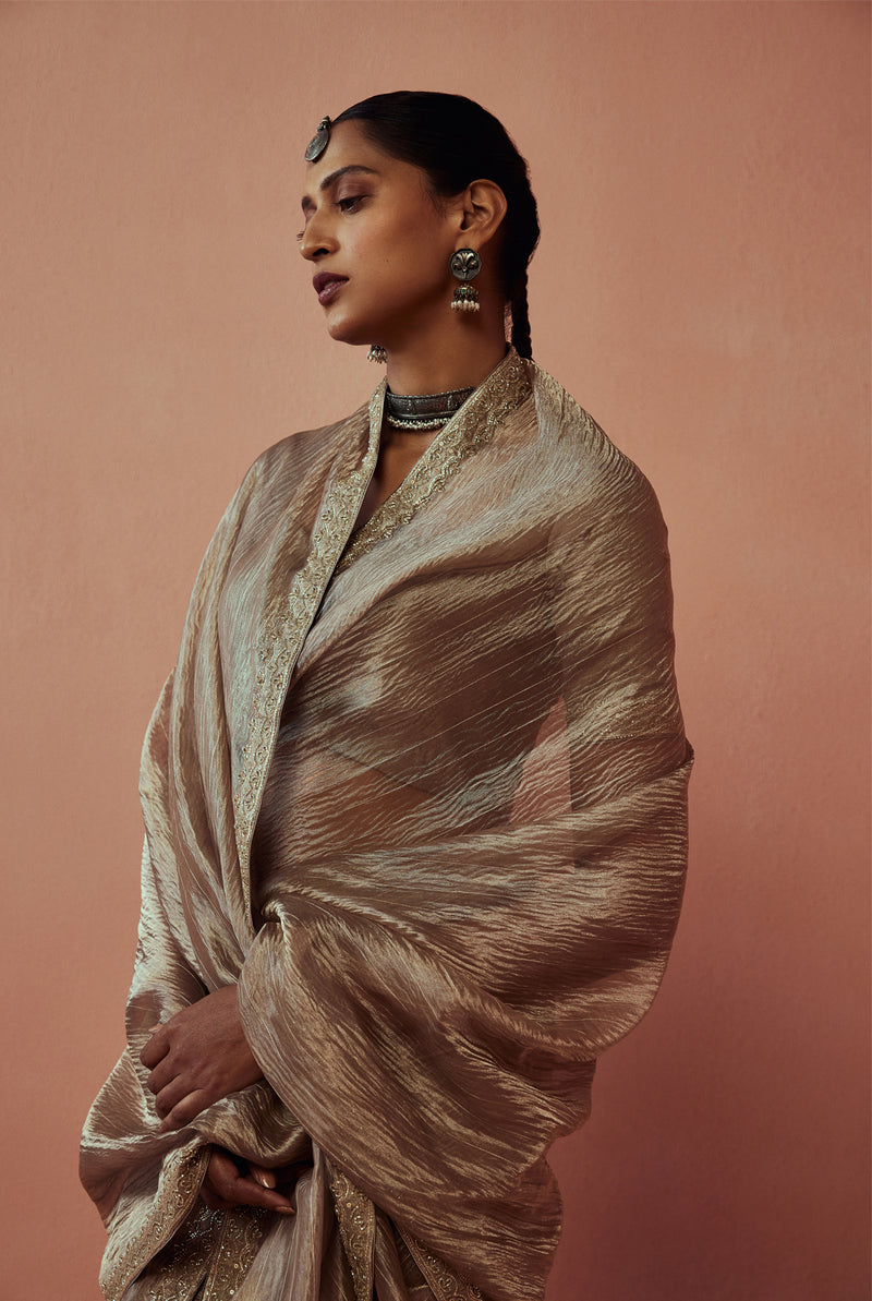 Pure tissue saree with crinkled texture