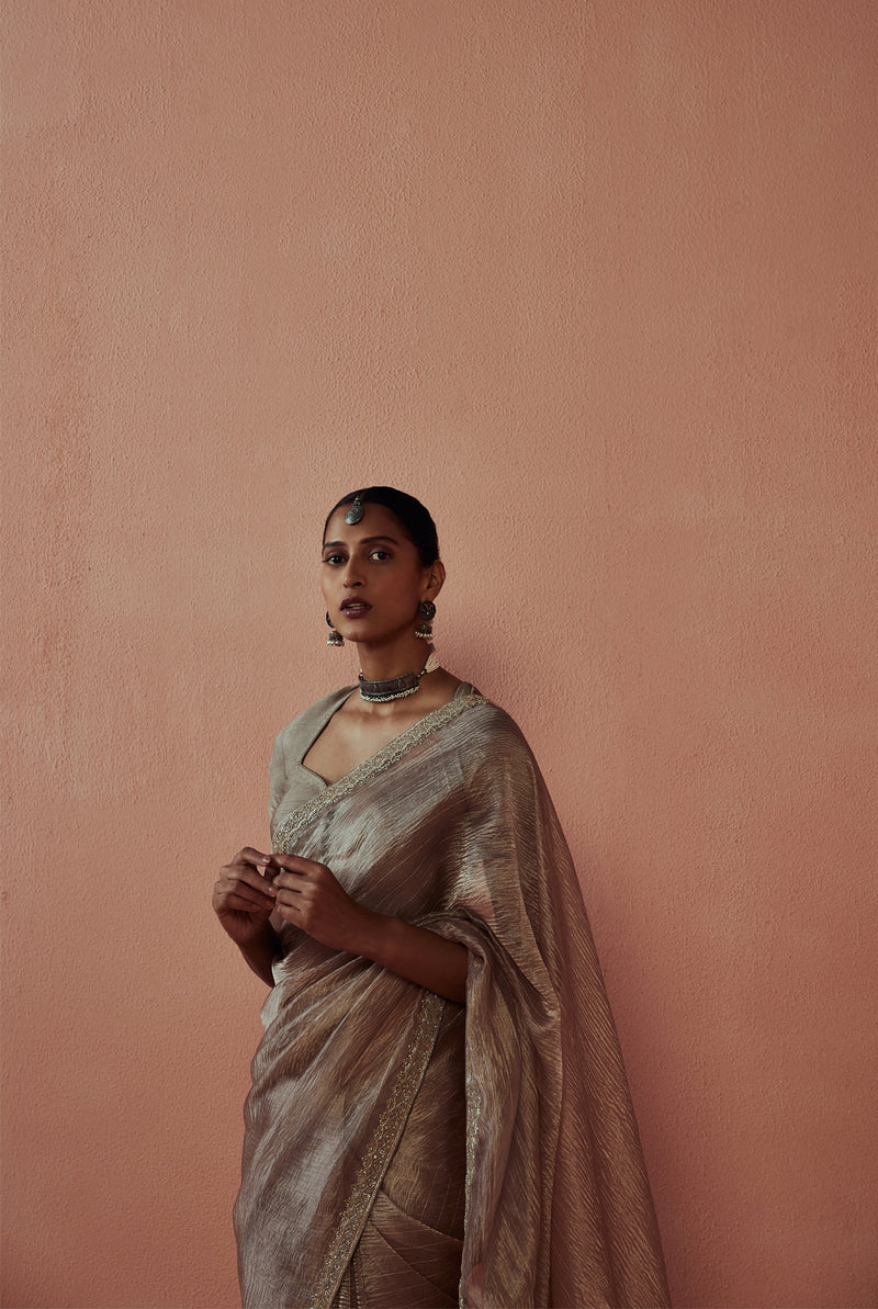 Pure tissue saree with crinkled texture