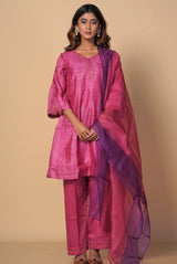 A women wearing fuschia pure tussar party wear salwar suit, ethnic wear for women