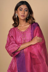 A women wearing fuschia pure tussar party wear salwar suit, ethnic wear for women