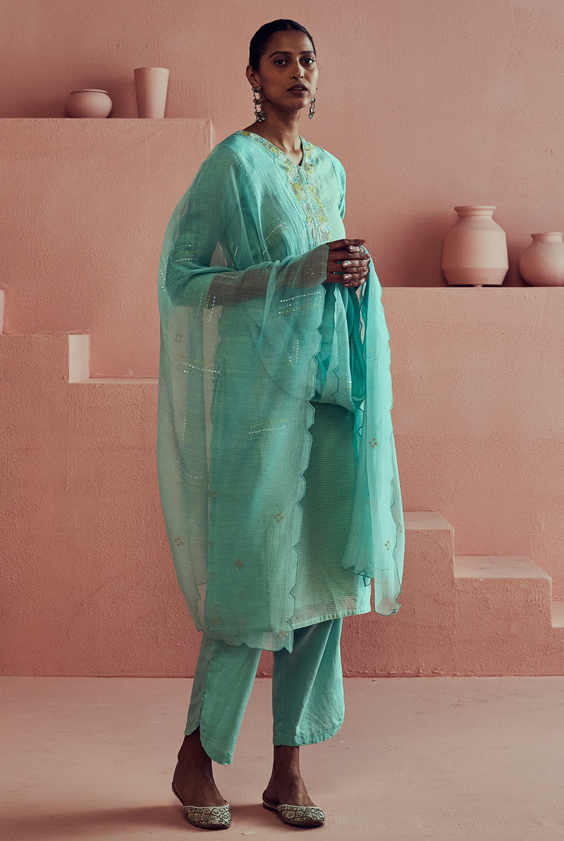 A women wearing pure fancy chanderi firoza suit set with malai chanderi dupatta, ethnic wear for women.