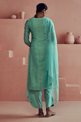 A women wearing pure fancy chanderi firoza suit set with malai chanderi dupatta, ethnic wear for women.