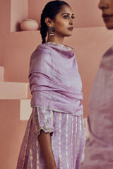 A women wearing pure fancy chanderi lilac angrakha style suit set, party wear for women.