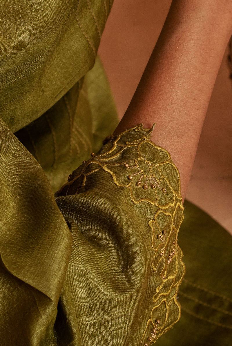 A women wearing olive pure tussar kurti set, ethnic wear for women