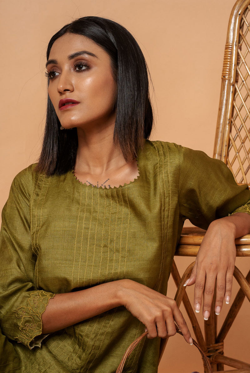 A women wearing olive pure tussar kurti set, ethnic wear for women